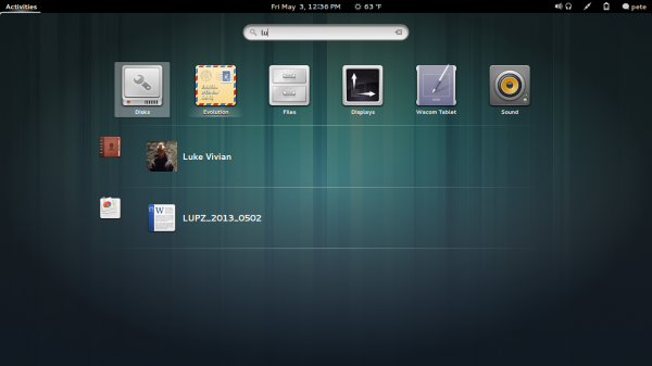 Just start typing after pressing the super key and you can search applications, files, contacts and even Google Drive documents.