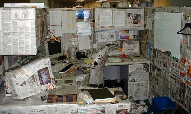 Cubicle Decorating - with newspapers
